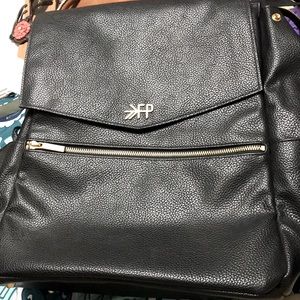 Mens baby diaper bag by fP new. Never really used. Looks luxurious